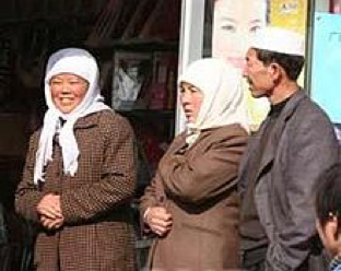 Two Hui women and a man, one of many ethnic minorities in China
