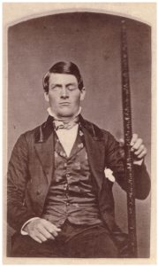 Portrait of brain-injury survivor Phineas P. Gage (1823–1860), shown holding the tamping iron which injured him.