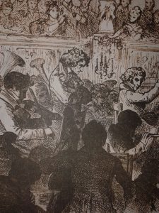 Engraving of an orchestra performance with musicians and an attentive audience in an ornate setting.