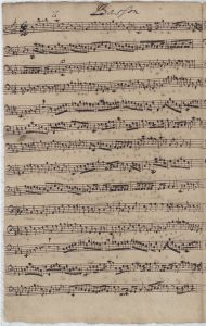 Handwritten sheet music on aged paper with dense musical notation.