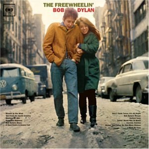 Album cover showing two people walking on a snowy street with the title "The Freewheelin' Bob Dylan" above them.