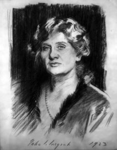 Black and white drawing of a woman with wavy hair, wearing a fur-trimmed garment and pearls. Inscriptions read "1923."