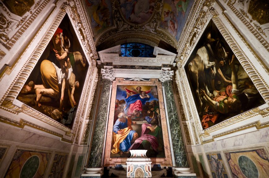 View of the Cerasi Chapel in Santa Maria del Popolo in Rome with Annibale Carracci’s altarpiece, The Assumption of the Virgin, 1600–01, oil on canvas, 245 cm × 155 cm, and paintings by Caravaggio on the side walls (The Crucifixion of St. Peter on the left, and The Conversion of Paul on the right) (photo: Frederick Fenyvessy, CC BY 2.0)