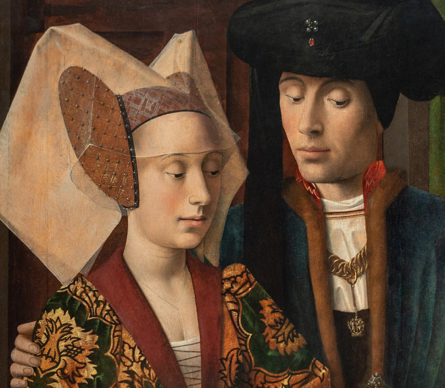 Couple (detail), Petrus Christus, A Goldsmith in his Shop, 1449, oil on oak panel, 100.1 x 85.8 cm (The Metropolitan Museum of Art; photo: Steven Zucker, CC BY-NC-SA 2.0)