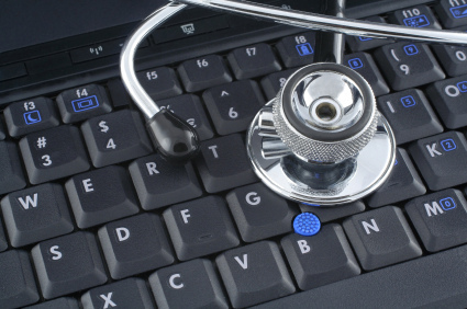Picture of a stethoscope on top of a keyboard